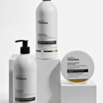 Три продукта YOUtoo: шампунь, кондиционер и кератиновая маска на белых подиумах — YOUtoo