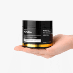 Рука держит чёрную банку YOUtoo Keratin Nutrition Hair Mask 350 мл — YOUtoo